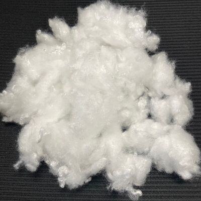 Qualité 2.8D*32MM PBT PET Composite Fibre Staple, Crimp latent Fibre élastique élevée pour tricoter des vêtements Excellente capacité de rotation de remplissage Fibre usine